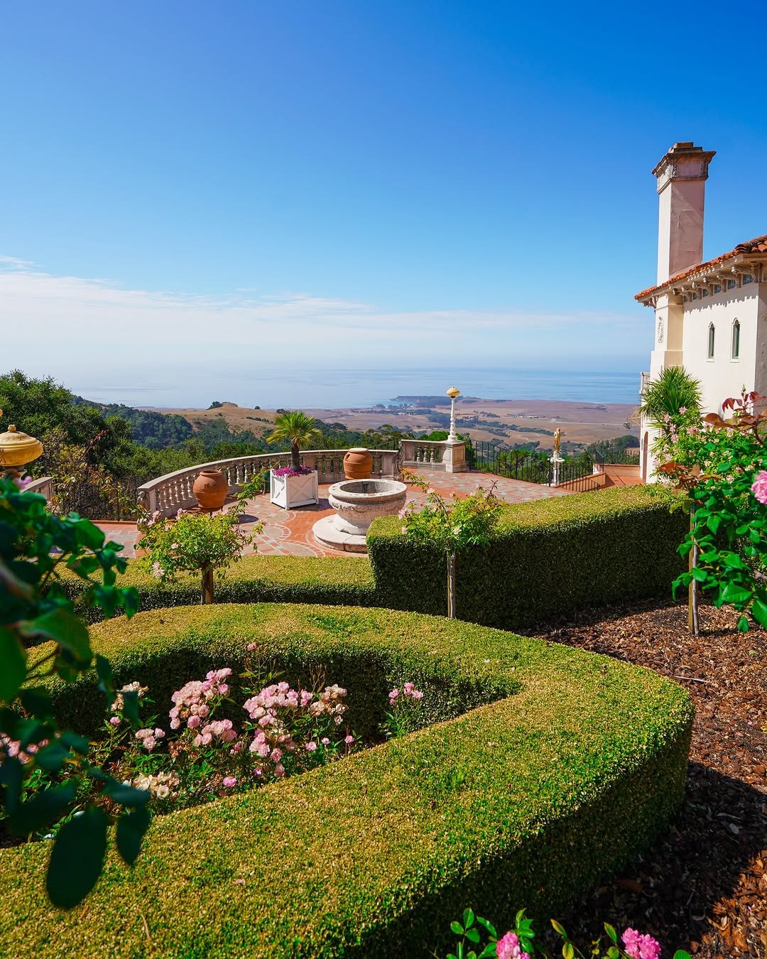 Gardens and a white tower at Hearst Castle above the Central Coast
