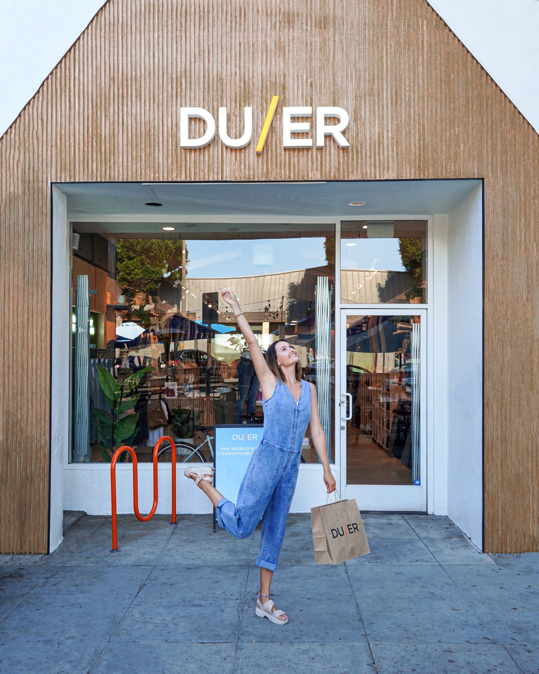 Polina outside the DUER store