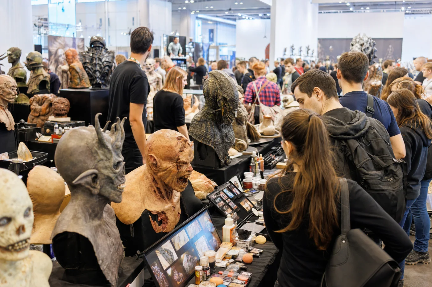 Sample picture: creature-effects sculptures on convention tables
