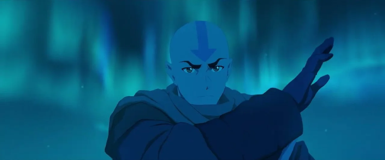Aang glows blue and stretches out his arm under the northern lights in a scene from Avatar Aang: The Last Airbender.